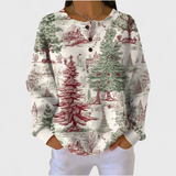 Doireann | Cream Jumper Featuring a Winter Forest Design